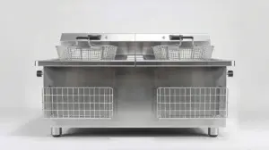 Fotografia profissional de uma fritadeira industrial de inox com duas cubas, representando os melhores modelos para cozinhas comerciais.