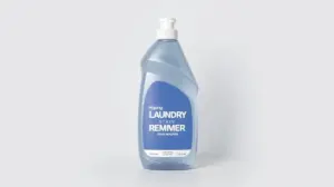 Fotografia profissional de um frasco de tira manchas de roupas, simbolizando os melhores produtos disponíveis para lavanderia.