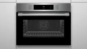 Fotografia profissional de um moderno forno de embutir a gás, representando os melhores modelos para cozinhas planejadas e funcionais.